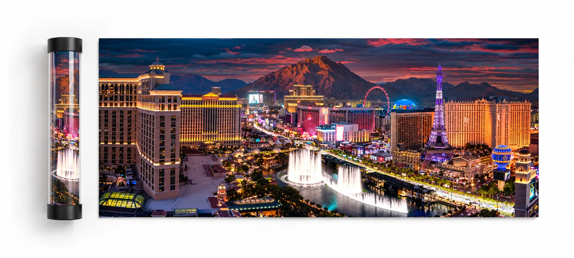 Overhead mockup of a Las Vegas panorama lying flat beside a matching print rolled inside a clear tube with black end caps