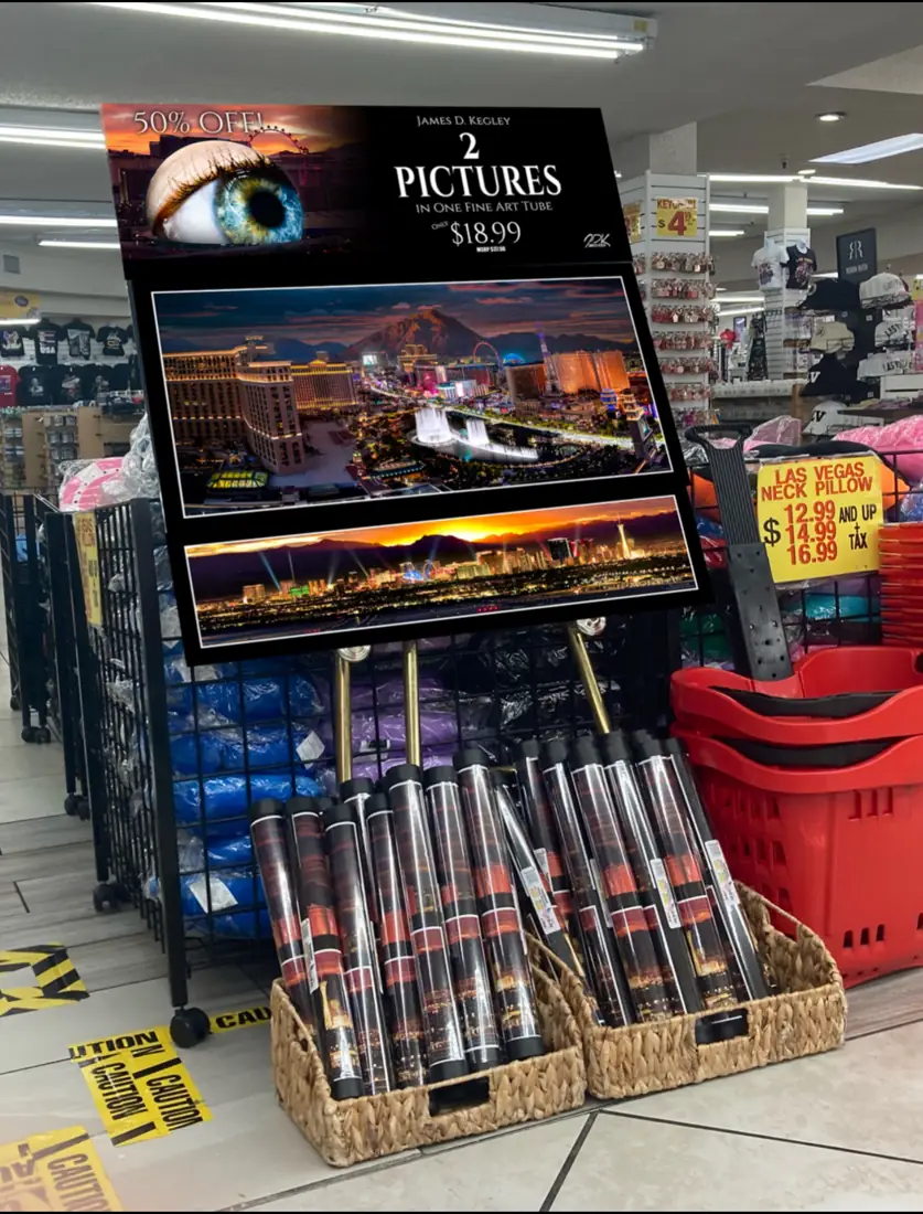 JDK Designs panoramic print rack and take-home tube basket in a gift shop